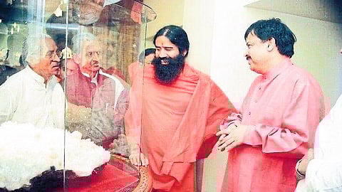 K C Pande with Baba Ramdev
