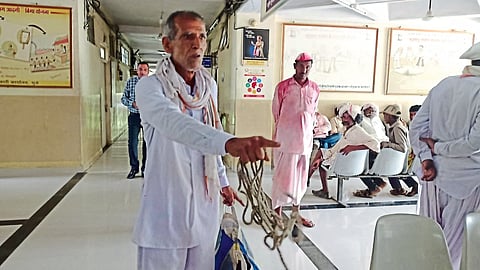 Farmer Yograj Patil came to the agricultural land collector's office with a rope for hanging on Friday.