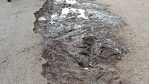 mud formed due to the unrepaired road dividers dug up to lay pipelines.