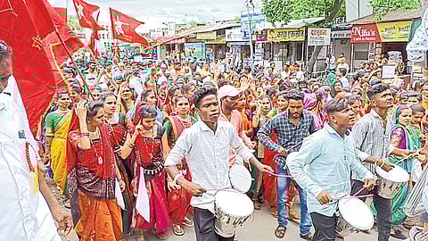 A grand procession was held on Tuesday on the occasion of World Tribal Day. In the second photo, students performing dance in the program.