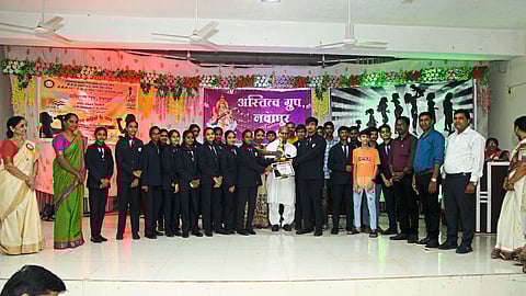 The winning group and dignitaries of 'Ek Sham Shaheedoke Naam' inter-school patriotic song singing competition organized by Astitta Group and Senior College Navapur.