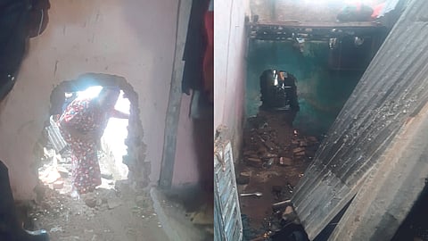 collapsed house on the bank as part of the Qazi Gadhi collapsed.