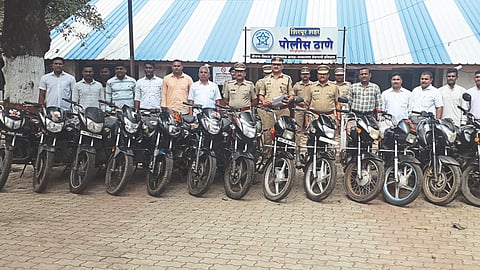Superintendent of Police Praveen Kumar Patil while showing the seized bike.