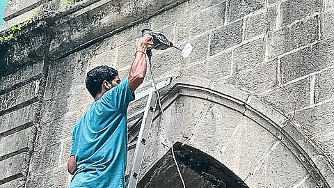 ongoing work of installing CCTV in the British-era building of the East Divisional Office of the Municipal Corporation.