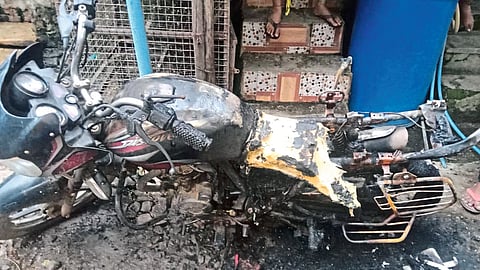 The burnt bike of Khatik from Shanipethe