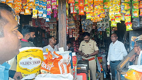 Police officers and staff while inspecting the spot