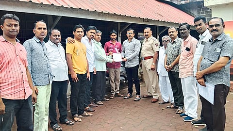 Manoj Pagar, Bhalchandra Kothavade, Dada Sonje giving a statement to Police Sub-Inspector Mahesh Nikam against encroachment