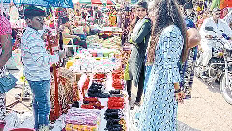 Citizens buying pooja materials for Diwali.