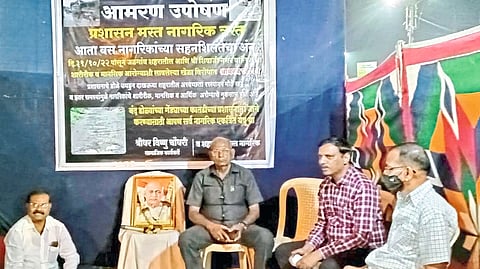 Sridhar Choudhary, a citizen of Shivajinagar, who is sitting on an indefinite hunger strike in front of the Municipal Corporation to demand the return of taxes due to non-construction of roads.