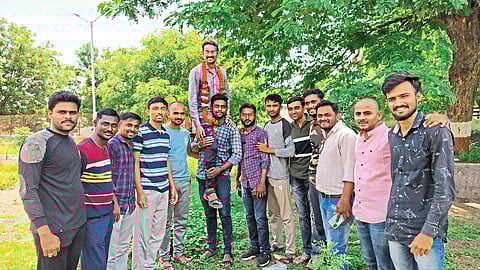 Fellow friends preparing for the competitive exam at Garuda Library cheered Prashant Jadhav on their shoulders for being selected as the Ministry Clerk.