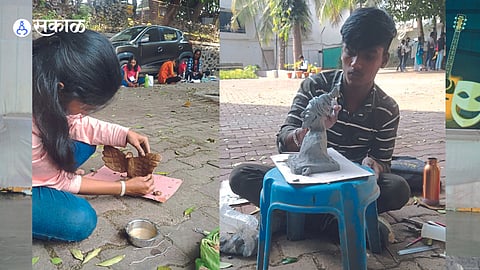 Students engrossed in creating sculptures during the sculpture competition at the 'Sakal-Yin' art festival at MSW College of MVIPR on Gangapur Road on Friday.