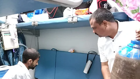 Provide Oxygen Cylinder to Small Child in Train