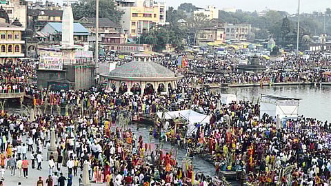 Crowd gathered at Ramkunda on Monday morning to pray to the sun.
