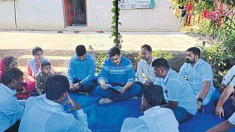MLA Rohit Pawar while questioning Gayatri's family. Neighbors Purushottam Kadlak, Harishchandra Bhawar, Manohar Bochre, Dhananjay Joshi, Lanu Memane etc.