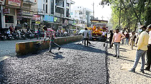 Ongoing asphalting of road at Court Chowk.