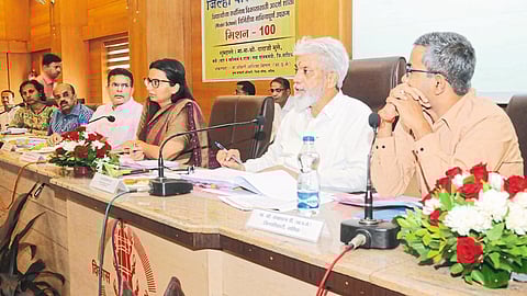 Guardian Minister Dada Bhuse while reviewing the work in Raosaheb Thorat Hall of Zilla Parishad on Friday.