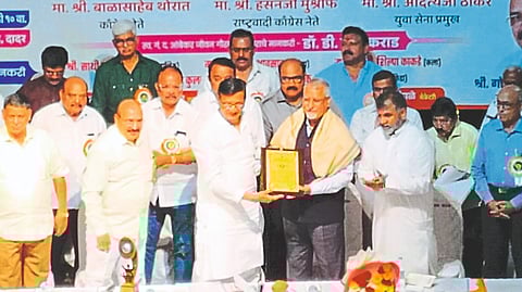 Nashik: While felicitating Dr. Vikrant Jadhav for getting the first prize for his thesis 'Ayurvedic Medicine through Telemedicine' at the World Ayurveda Congress in Goa on Tuesday, the president of the library Prof. Dilip Phadke. Along with library officials.