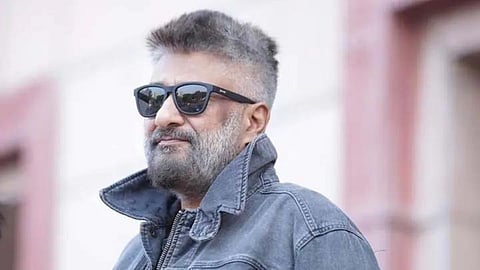 Vivek Agnihotri gets brutually trolled as he goes for morning walk y category security cover