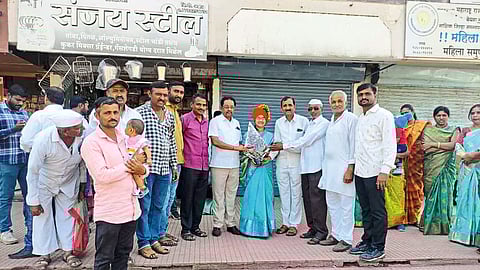 Villagers of Pimpalgaon (Va.) congratulating Sulabha Aher on her election as the Municipal President of Nagar Panchayat.