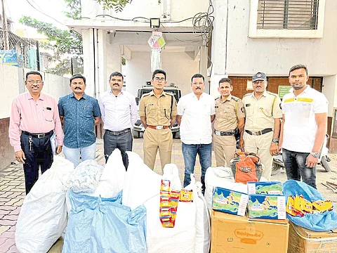 Dhule: Deputy Superintendent of Police Hrshikesh Reddy and the action team present in the city with the seized Gutkha stocks
