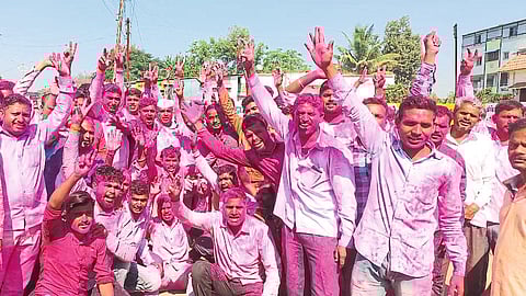 Newly elected sarpanch and supporters cheering outside the tehsil office here after the gram panchayat results.