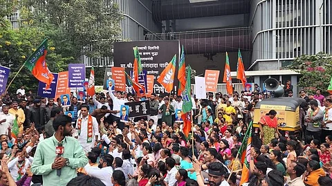 BJP aggressive due to attack on Chandrakant Patil Protest against ink attack politics pune