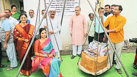 Special public prosecutor Shishir Here during the wedding ceremony of Aishwarya from the Here family. Neighbors are groom's father Hemant Hire, Atul Mahajan and family.