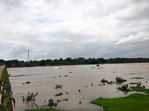 Bhadgaon : Water flowing through Girna river during monsoon