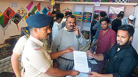 City police team issuing notices to kite sellers at yeola.