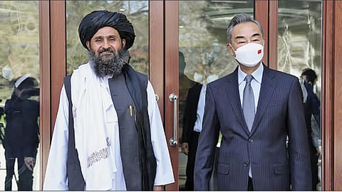 mulla abdul ghani baradar and wang yi
