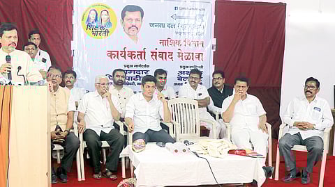 MLA Kapil Patil speaking at the Shikshakar Bharati meeting held at Kalika Mandir Auditorium. Ashok Belsare, Satyajit Tambe, MLA Dr. Sudhir Tabe and officials.