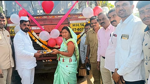 Sarpanch Dinesh Gaikwad, Sonali Gaikwad worshiping the bus of ST Corporation after it ran for the first time in 75 years of independence at Lavade Bhamer (Baghlan).