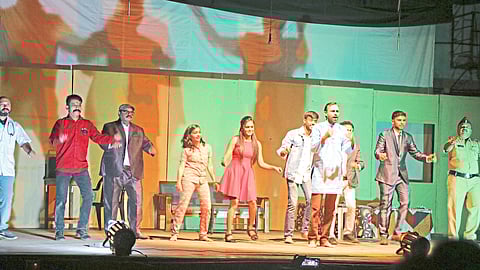 Actors of Workers' Welfare Center Tilak Chowk, Chalisgaon, performing scenes from the play "Kay Danger Vara Sutlai" at the drama festival organized by Kamgar Kalyan Mandal.