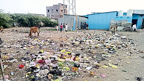 Garbage lying on an open plot in Masternagar area here.