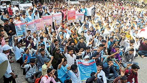 Students protesting outside Adivasi Vikas Bhavan regarding various issues of tribal students.