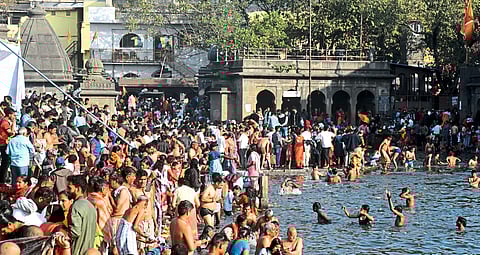 A crowd gathered to bathe at Ram Tirtha