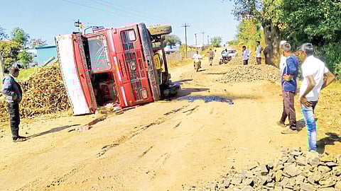 An overturned sugarcane truck