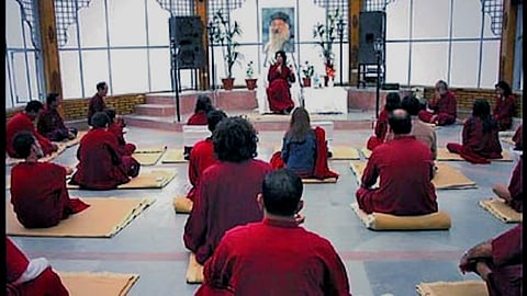 protest against osho ashram administration pune