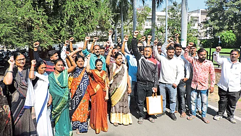 Civilian contract employees agitating for various demands.
