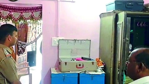 Assistant Police Inspector Nilesh Wagh inspecting a stolen house