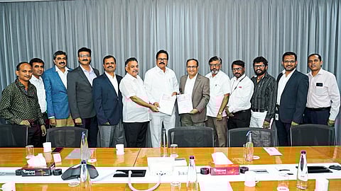 Company management officials and Dutta Samant Praneet Association of Engineering Workers officials on salary increment agreement in ABB India Limited Company.