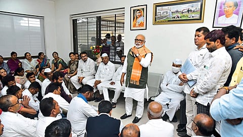 Senior leader Chhagan Bhujbal speaking at the review meeting of NCP on Saturday. Activists and officials in front.