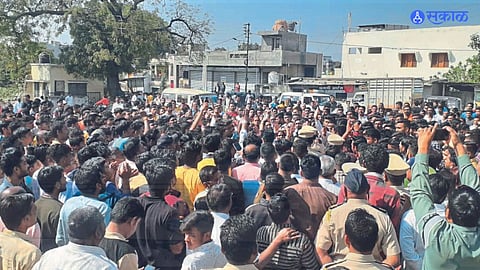 Police pacifying angry crowd outside the police station