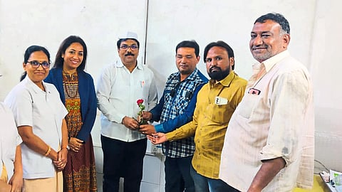 Dr. Resident Medical Officer Dr. Member of District Medical Patient Committee Zubair Hashmi and colleagues felicitating Nitin Rawate.