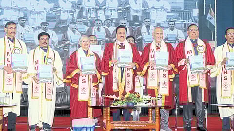 Medical Education Minister Girish Mahajan releasing the MBBS syllabus at the convocation ceremony of maharashtra University of Health Sciences.