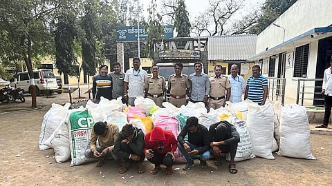 Police team with suspects arrested in cotton theft case