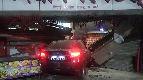 speeding car enters sweet shop