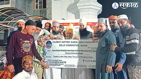 Muslim brothers handing over the financial aid collected for the earthquake victims to senior religious leaders.