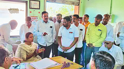 Officials of the association discussing with the officials about regular electricity