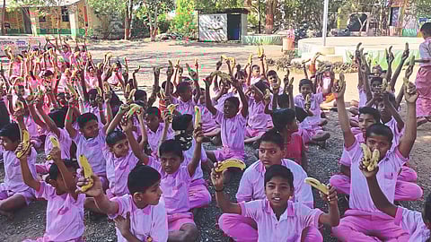 Pupils with extra food bananas at Zilla Parishad Primary School here.